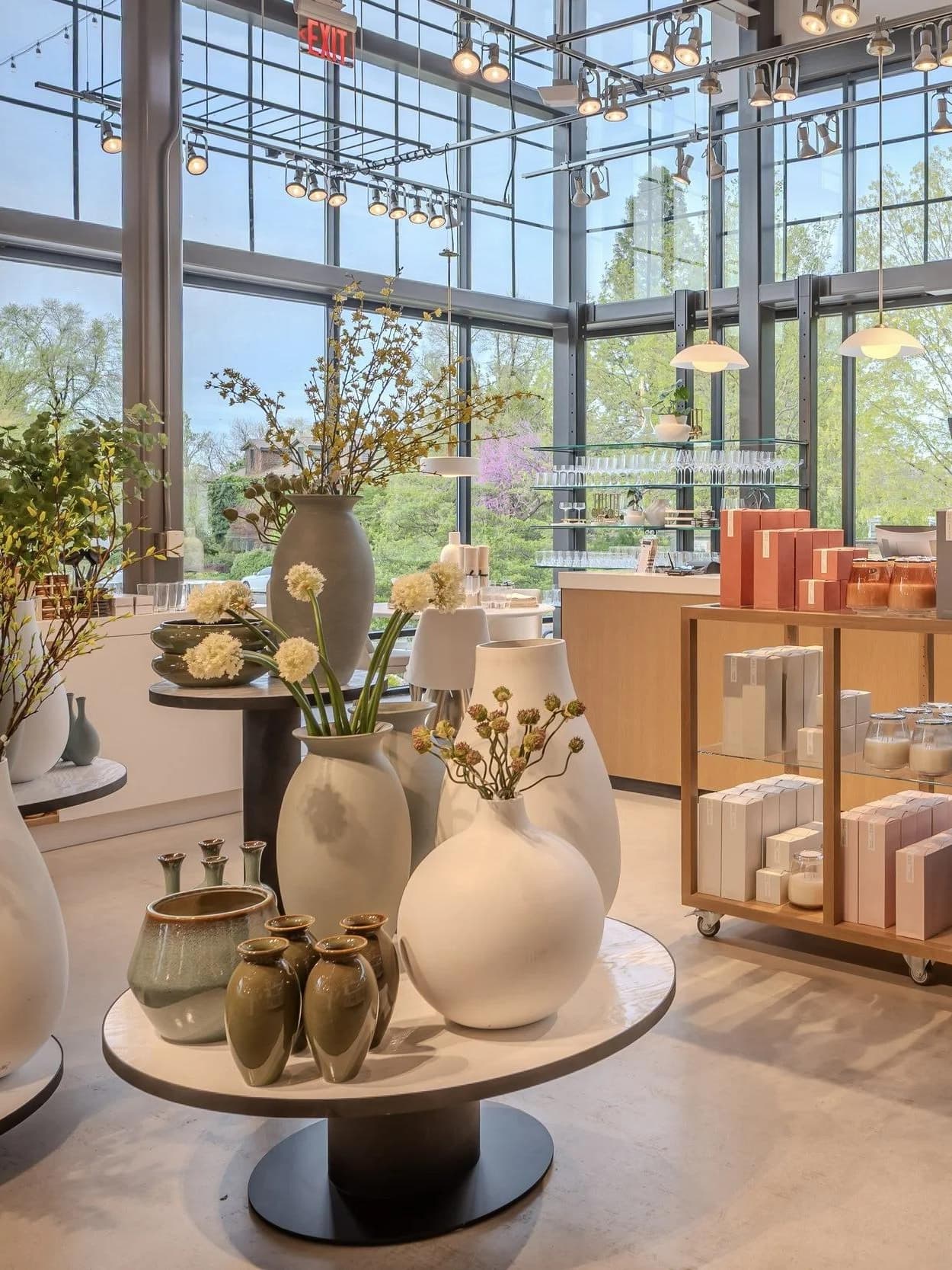 Interior design store display of decorative vases and artwork